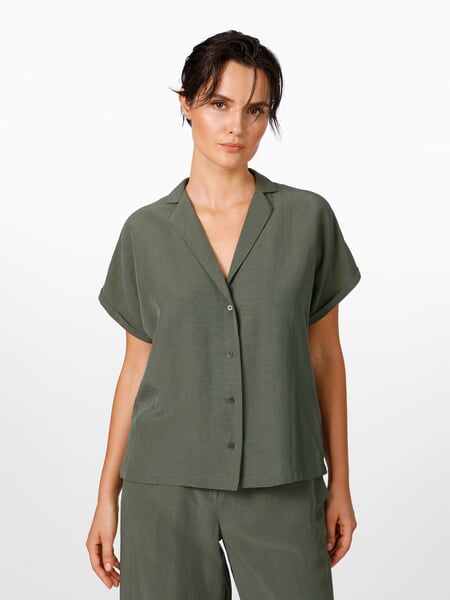Women's Blouse with Lapel Collar Medium Green, presented on a model