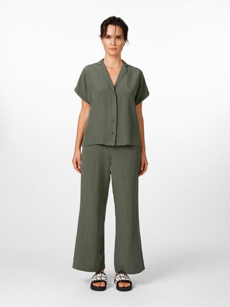 Women's Blouse with Lapel Collar Medium Green, presented on a model