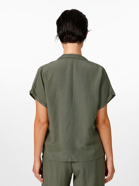 Women's Blouse with Lapel Collar Medium Green, presented on a model