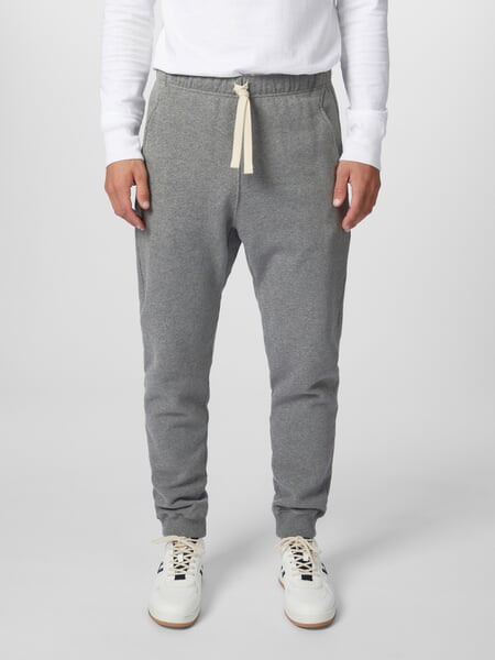 Men sweatpants Grey melange, presented on a model