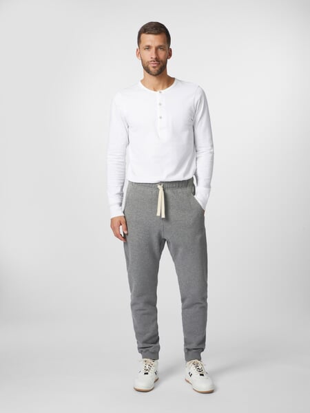 Men sweatpants Grey melange, presented on a model