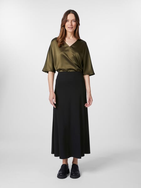 Women’s Piqué Skirt Black, presented on a model