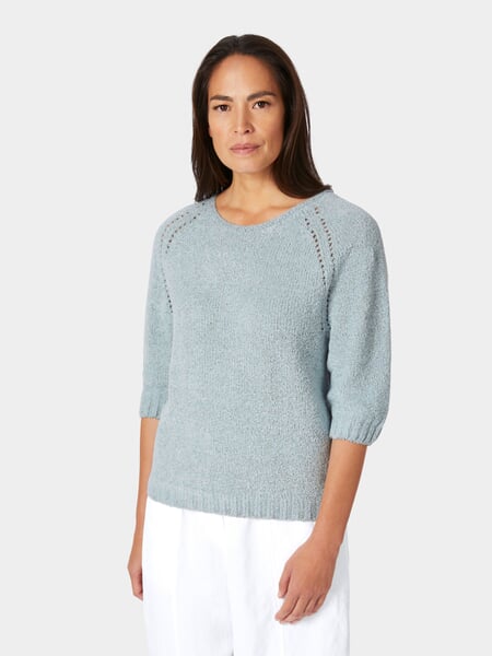 Women’s Short-Sleeve Knit Shirt Light blue, presented on a model