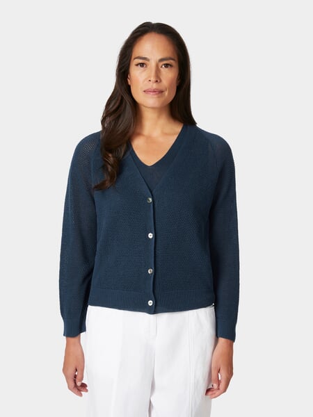 Damesvest met knopen Blauw, gepresenteerd op een model