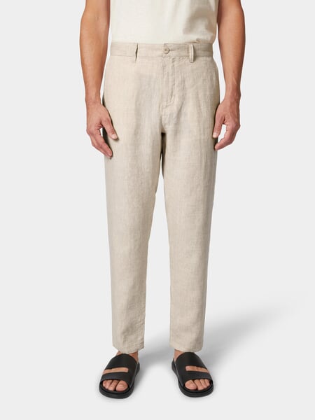 Men's linen pants Sand melange, presented on a model