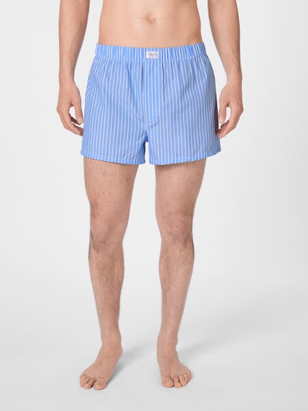 Boxer homme tissé Blanc de construction claire, présenté sur un modèle