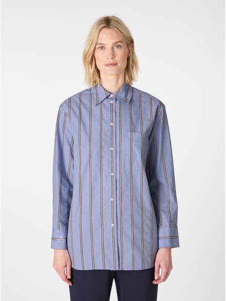 Women's striped shirt blouse Light blue, presented on a model