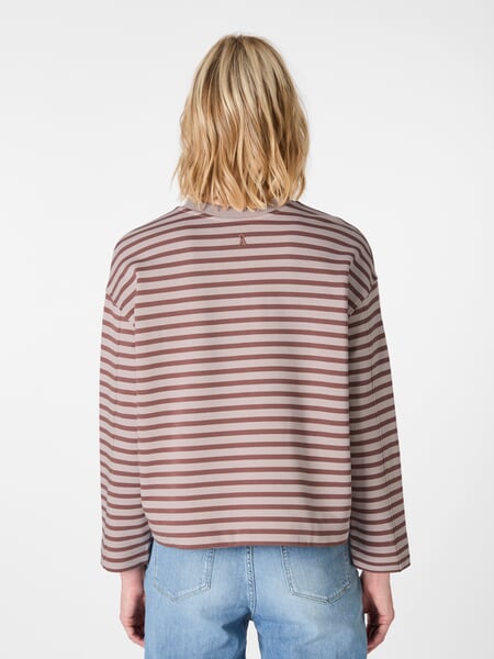 Ladies sweatshirt striped Rosé-wine red, presented on a model