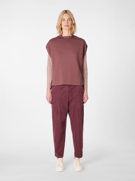 Women's Knit Sleeveless Sweater Coral, presented on a model