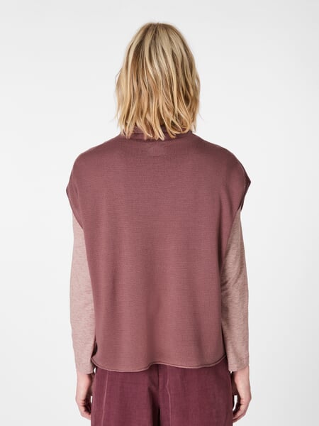 Women's Knit Sleeveless Sweater Coral, presented on a model