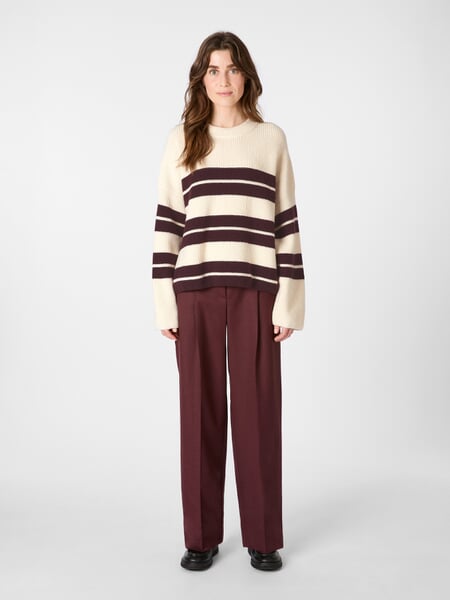 Women’s Striped Sweater Natural Bordeaux, presented on a model