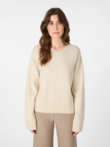 Women’s Knit Sweater Natural white, presented on a model