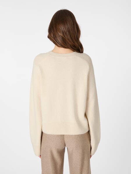 Women’s Knit Sweater Natural white, presented on a model