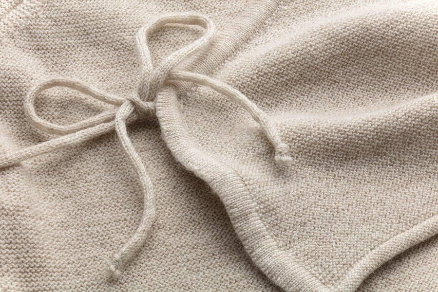 Baby-Wickeljacke Merinowolle Beige, Detailsicht