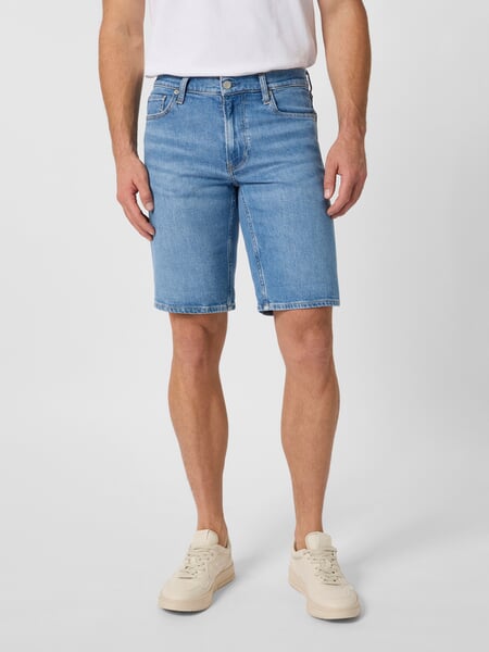 herenjeansshorts Denim, gepresenteerd op een model