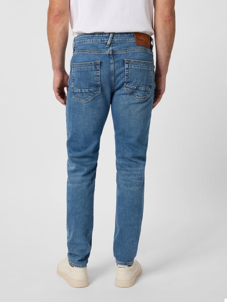 Men’s Jeans, Regular Slim Fit." Denim." Used, presented on a model