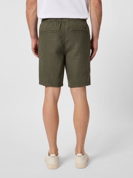 Men's linen shorts Olive, presented on a model