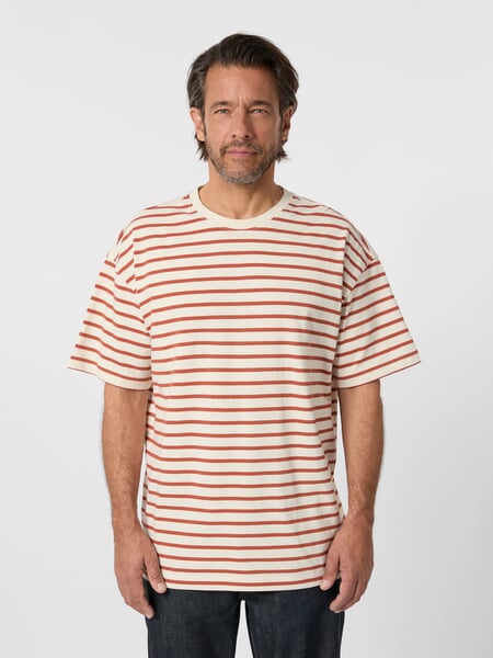 Men striped shirt Off-white rust red, presented on a model