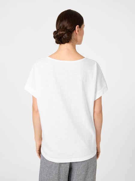 Women's Short-Sleeve Shirt White, presented on a model