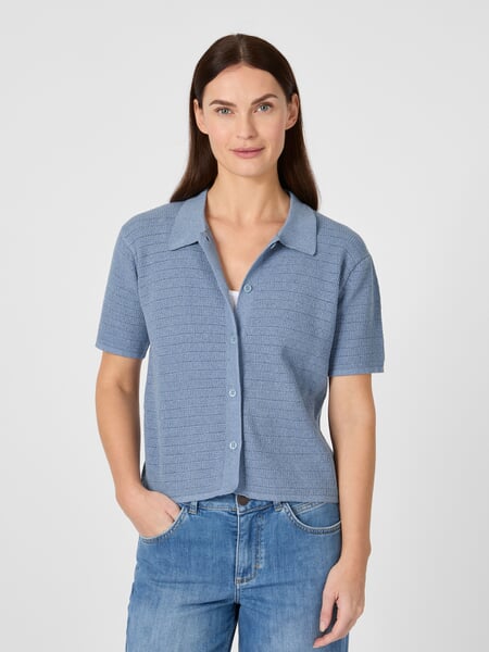 Women’s Knitted Button-Down Polo Shirt Light blue, presented on a model
