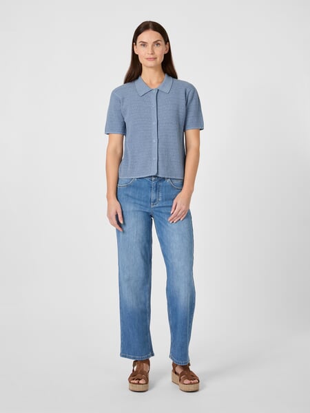 Women’s Knitted Button-Down Polo Shirt Light blue, presented on a model
