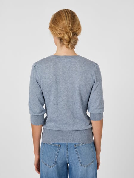 Women’s Knit Shirt Light blue, presented on a model