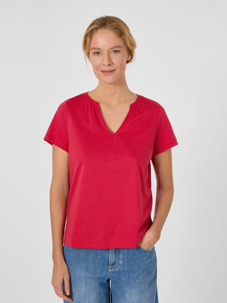 Jerseybluse til kvinder Rød, præsenteret på en model