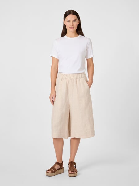 Women's Linen Bermuda Shorts Natural, presented on a model