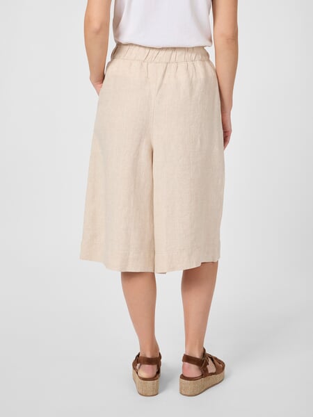 Women's Linen Bermuda Shorts Natural, presented on a model