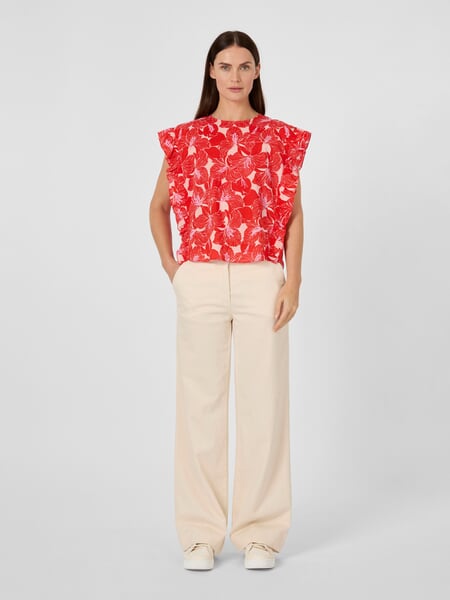 Women's Volant Blouse Shirt Red with a pattern, presented on a model