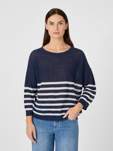Stribet strikbluse til kvinder Marineblå-hvid, præsenteret på en model