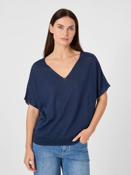 Women's Knitted V-Neck Shirt Navy, presented on a model