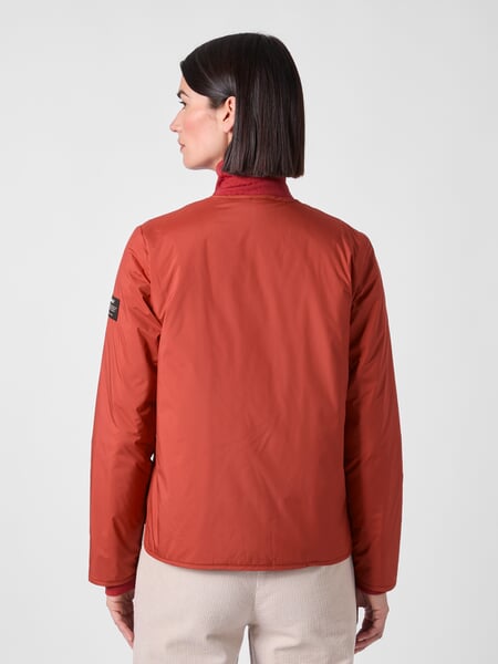Women's Short Quilted Jacket Orange, presented on a model