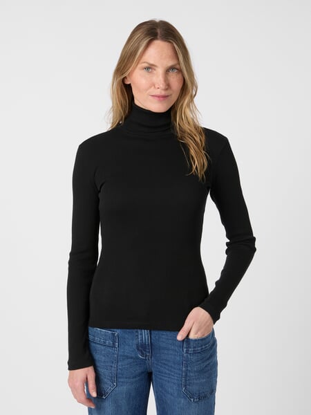 Dame-rullekraveshirt Sort, præsenteret på en model