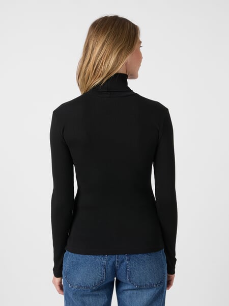 Dame-rullekraveshirt Sort, præsenteret på en model