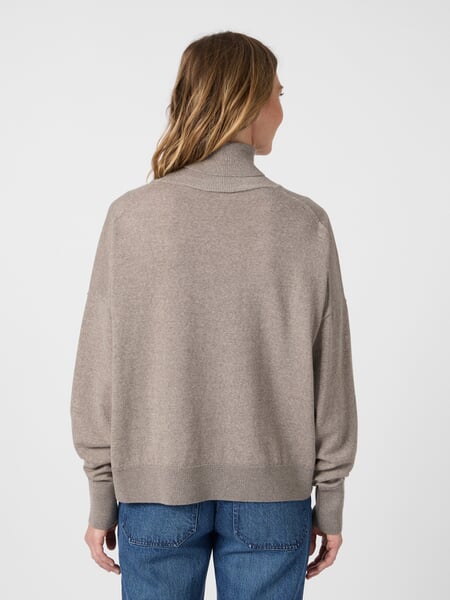 Women’s Turtleneck Sweater Light brown, presented on a model