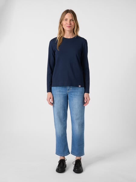 Women’s Long-Sleeve Interlock T-Shirt Navy, presented on a model
