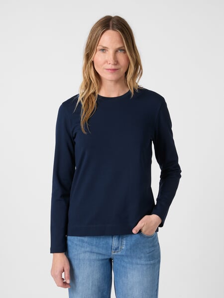 Women’s Long-Sleeve Interlock T-Shirt Navy, presented on a model