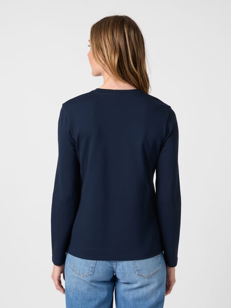 Women’s Long-Sleeve Interlock T-Shirt Navy, presented on a model