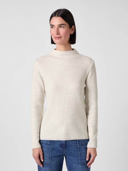 Women’s Long-Sleeve Knit Shirt Natural white, presented on a model