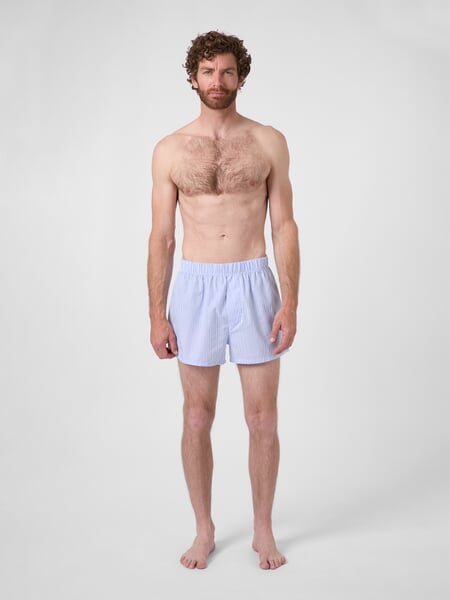 Men's woven boxer shorts White light blue, presented on a model