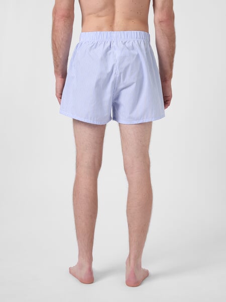 Men's woven boxer shorts White light blue, presented on a model