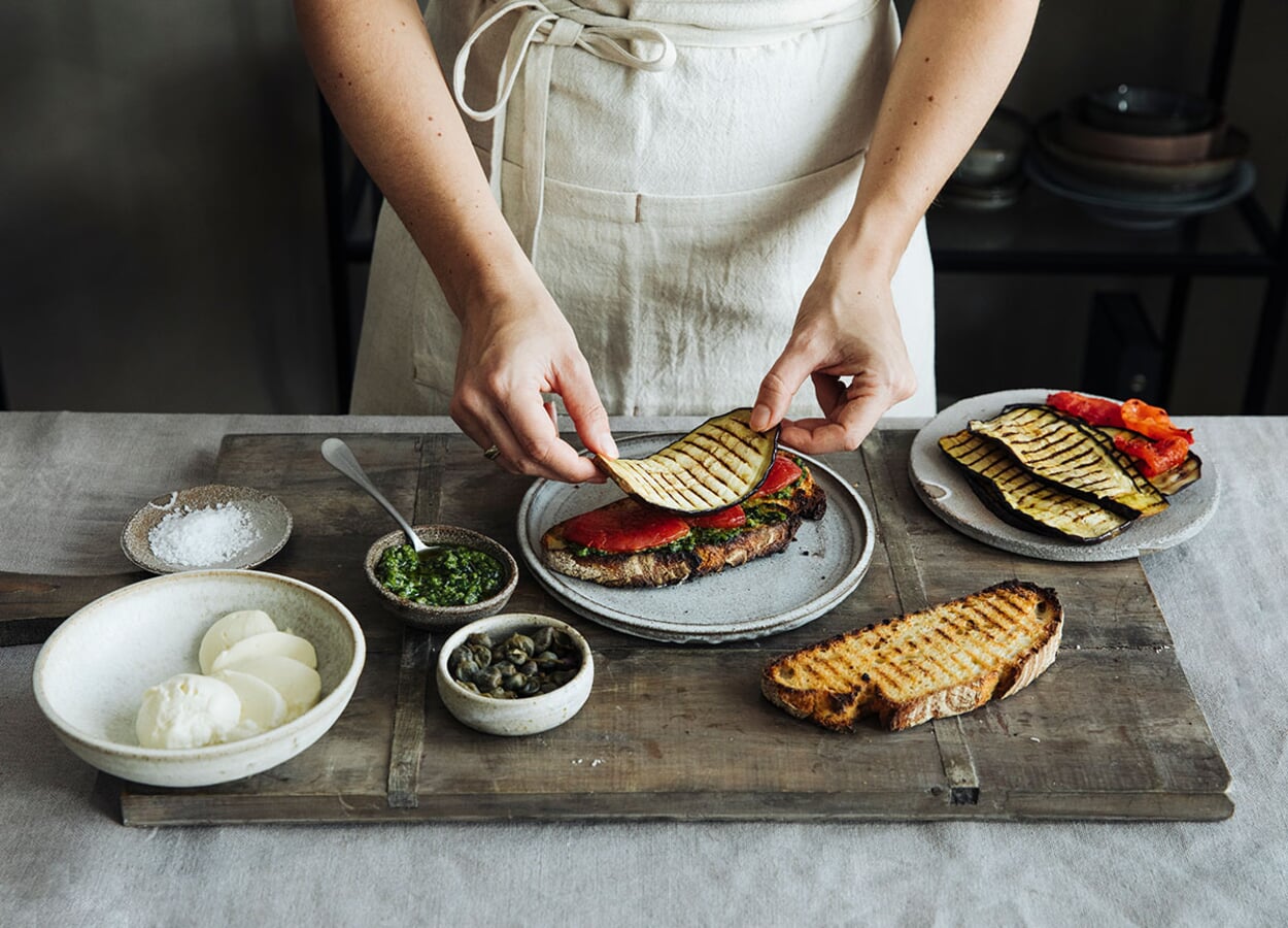 Panini with grilled vegetables, basil pesto, mozzarella and salted capers