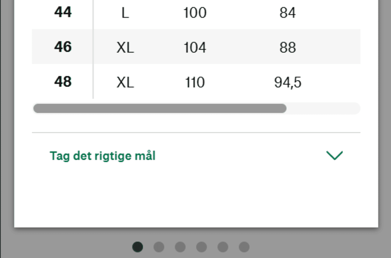 Visning af en størrelsestabel med et link nedenunder til yderligere oplysninger om, hvordan man tager mål.