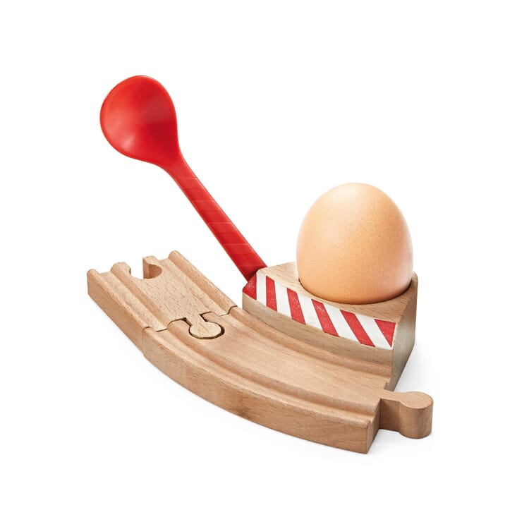 Egg cup with barrier