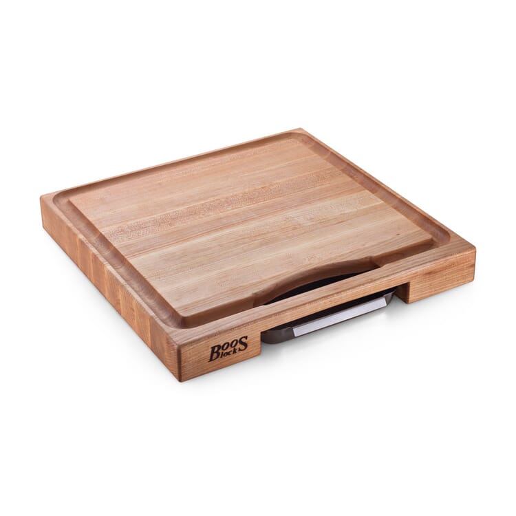 Cutting board with juice groove and drip tray