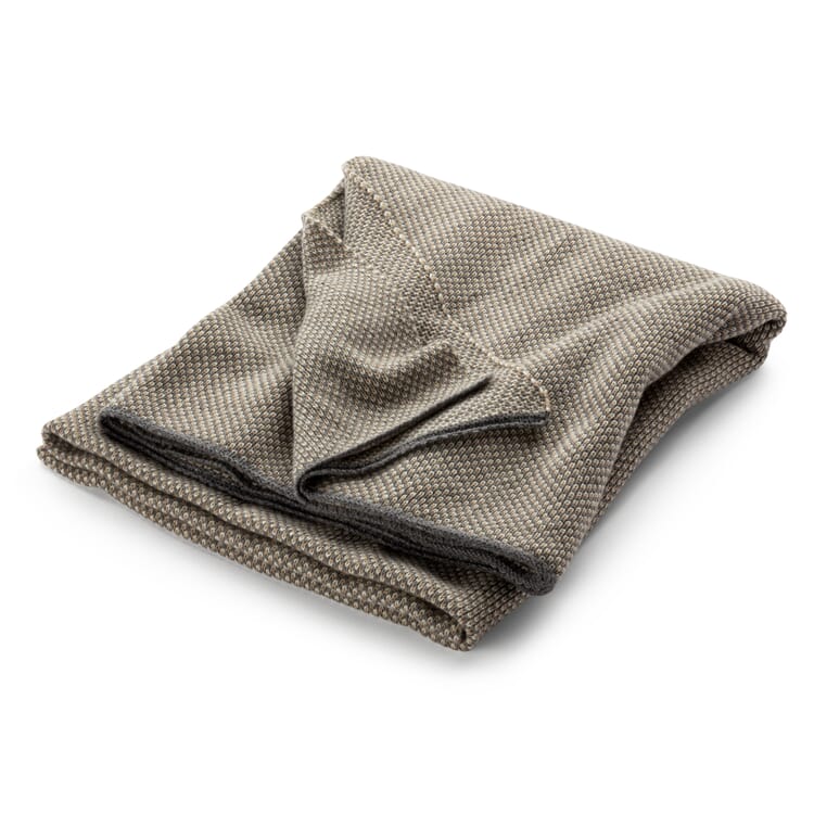 Strikket tæppe i merinould