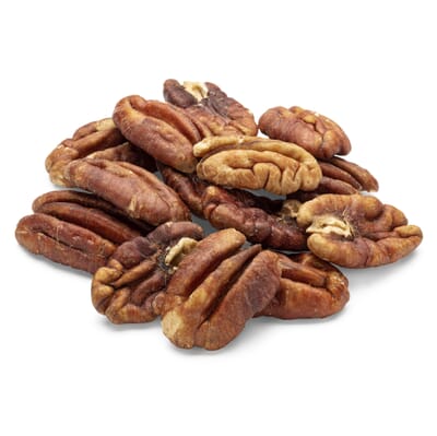 Premium Photo  Spreading organic pecans on a baking sheet lined