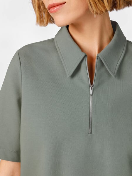 Damespoloshirt Groen, close-up